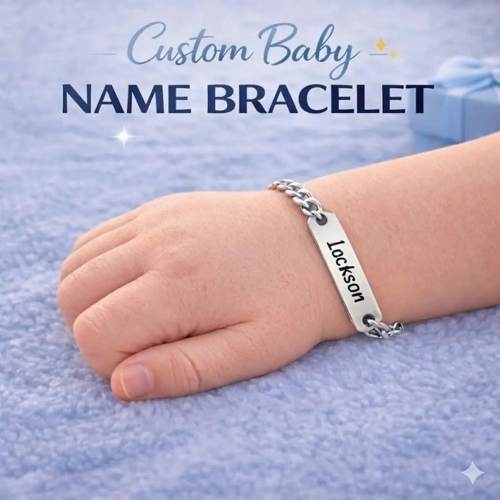 Child's hand wearing a silver name bracelet with 'Jackson' on a light blue background
