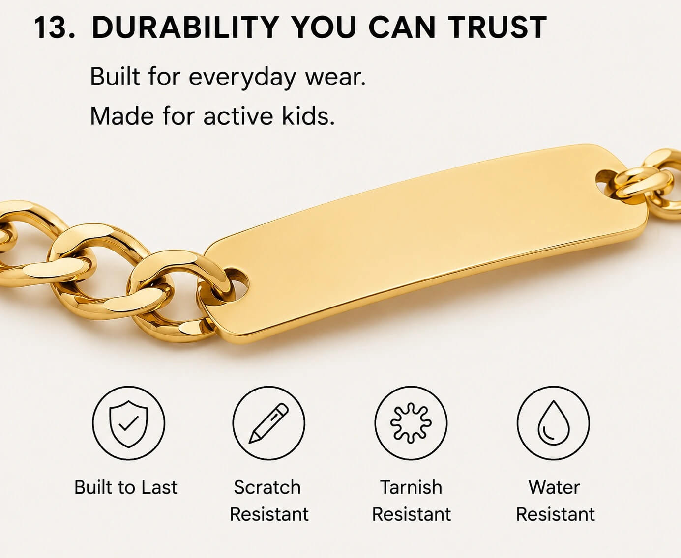 Gold chain with a tag on a white background, featuring durability text and icons.